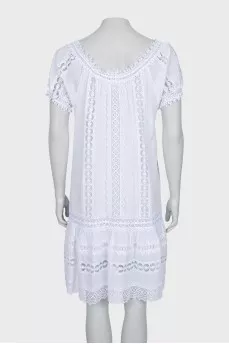 Dress with ties decorated with lace
