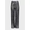 Sequin and beaded trousers with tag