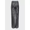 Sequin and beaded trousers with tag