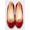 Red suede heeled shoes