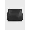 Leather bag with textile strap