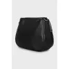 Leather bag with textile strap
