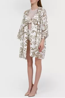Beach cape in print with tag