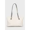 Quilted leather bag with handles