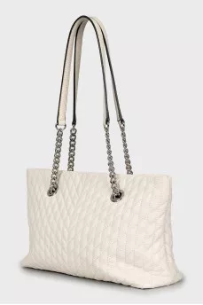 Quilted leather bag with handles