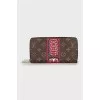 Brown wallet with signature print