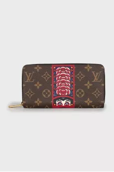 Brown wallet with signature print