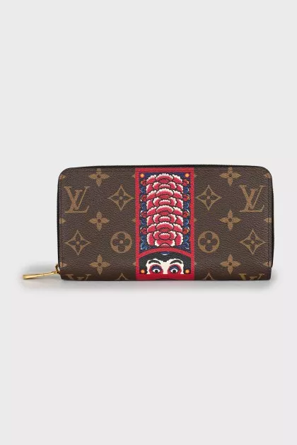 Brown wallet with signature print