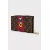 Brown wallet with signature print