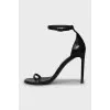 Black leather stiletto heeled sandals