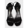 Black leather stiletto heeled sandals