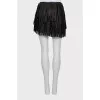 Leather mini skirt with fringe