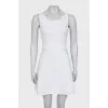 Fitted white dress with perforation