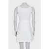 Fitted white dress with perforation