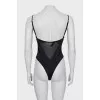 One-piece swimsuit with tag