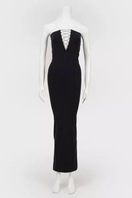 A tight -fitting dress with lacing in front