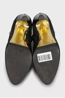 Leather ankle boots with a small print