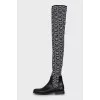 Black and white textile over the knee boots