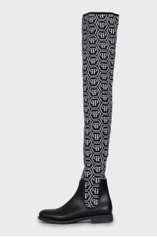 Black and white textile over the knee boots