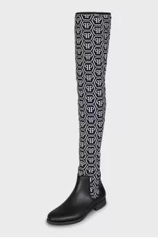 Black and white textile over the knee boots