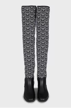Black and white textile over the knee boots