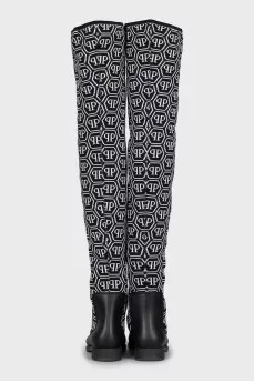 Black and white textile over the knee boots