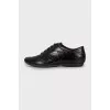Leather lace-up shoes with perforation