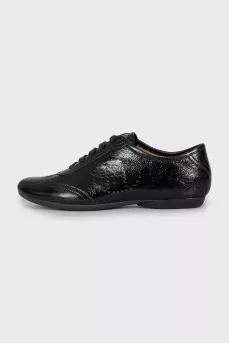 Leather lace-up shoes with perforation