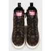 Sneakers with branded print patches
