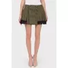 Woolen skirt in a fold with lace