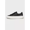 Leather sneakers with brand logo