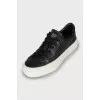 Leather sneakers with brand logo