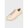 Beige leather sneakers