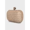 Knot leather clutch