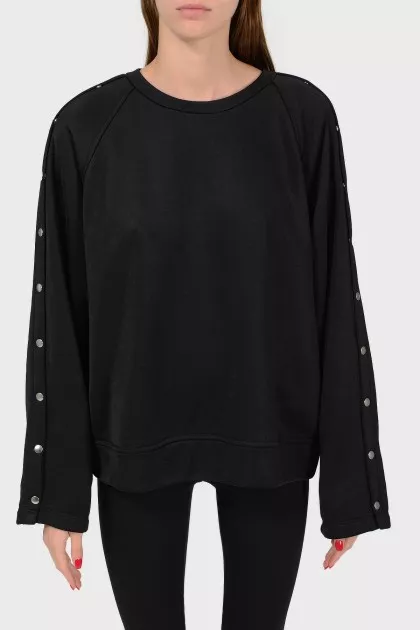 Black sweatshirt with buttons on the sleeves