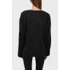 Black sweatshirt with buttons on the sleeves