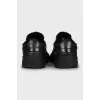 Men's black leather sneakers