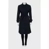 Trench coat with pleats