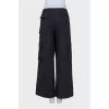 Mid-rise trousers with patch pockets
