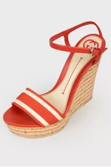 Red textile sandals on a high platform