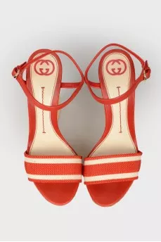 Red textile sandals on a high platform