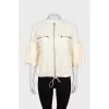 Windbreaker with zipped pockets
