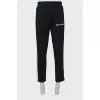Men's trousers with stripes and arrows