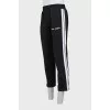 Men's trousers with stripes and arrows