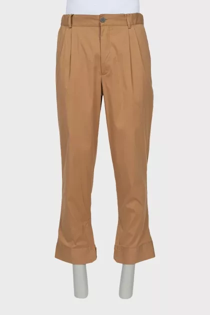Men's trousers with buttons at the bottom
