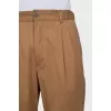 Men's trousers with buttons at the bottom
