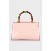 Leather bag with bamboo handle
