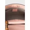 Leather bag with bamboo handle