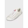 White sneakers with perforation