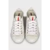 White sneakers with perforation
